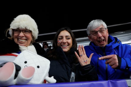 Matt Weston’s mum, Alison, his fiancee, Alex, and his dad, Tom, watch at the skeleton track in Cortina d’Ampezzo