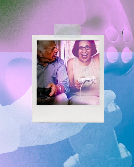 An older couple sitting on a couch. They are both holding video game controllers. While the man has an expression of disbelief, the woman is ecstatic.