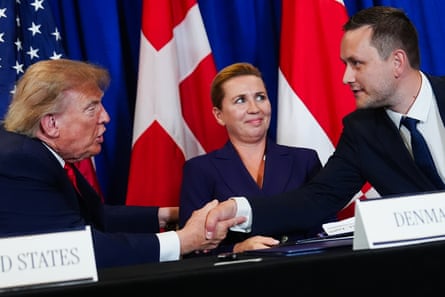 Trump and Nielsen shake hands as Frederiksen looks at Nielsen
