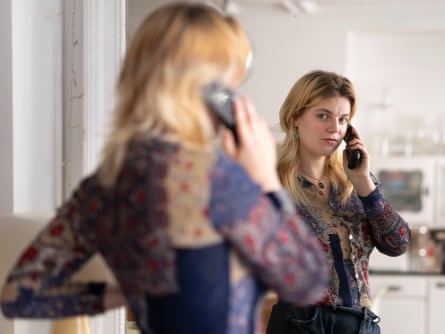 Izzy Bouric, 24, with her flip phone