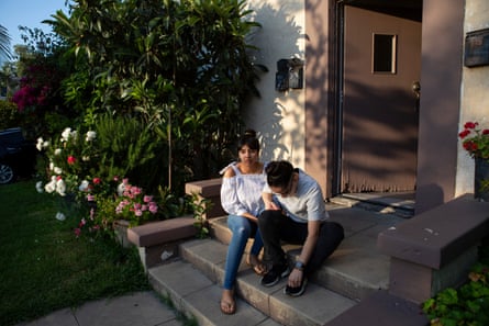 Karen and her wife Alex share a moment together on Karen's porch in Orange County, California where she grew up.