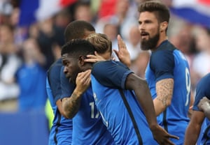 Samuel Umtiti of France is congratulated on scoring by team mates during the international Friendly match between France and England at Stade de France