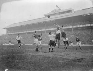 German goalkeeper Hans Jacob punches the ball clear