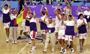 The Spanish basketball team celebrate their victory over Russia in the final of the 2000 Paralympics in Sydney.
