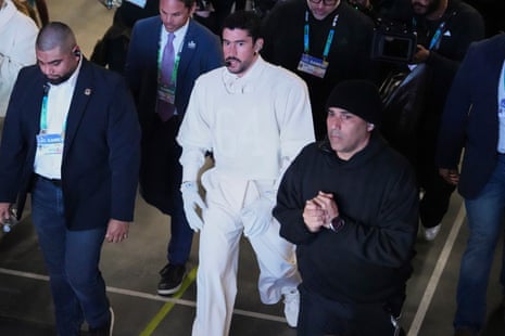 Bad Bunny takes the field to perform during halftime of the NFL Super Bowl 60 football game between the New England Patriots and the Seattle Seahawks, Sunday, Feb. 8, 2026, in Santa Clara, Calif. (AP Photo/Godofredo A. Vásquez)