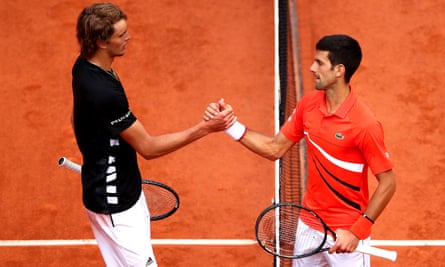 Alex Zverev and Novak Djokovic shaking hands at the net at the end of a match