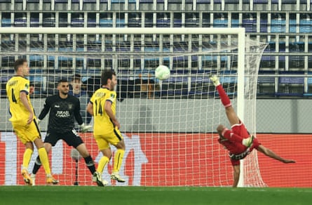 Ayoub El Kaabi scores with an overhead kick for Olympiacos’ fourth goal against Maccabi Tel Aviv forcing extra time in their Europa Conference League match.