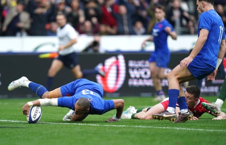 France's Gael Fickou (left) scores his side's fourth try of the game.