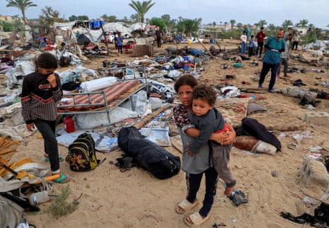 Aftermath of an Israeli airstrike on a tent camp sheltering displaced people in Khan Younis, southern Gaza.