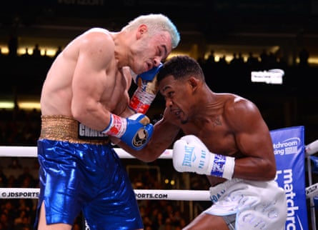 Danny Jacobs (right) lands a body shot on Julio César Chávez Jr during their December 2019 super-middleweight bout in Phoenix, Arizona