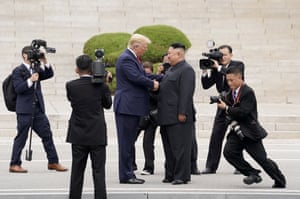 US President Donald Trump meets with North Korean leader Kim Jong Un at the demilitarized zone separating the two Koreas, in Panmunjom, South Korea, 30 June, 2019