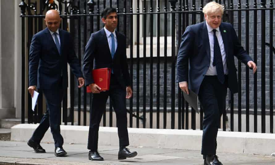 Sajid Javid, Rishi Sunak and Boris Johnson, photographed in September last year.