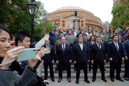 Wrestlers and representatives from Sumo Kyokai are photographed on the south steps outside of the Royal Albert Hall