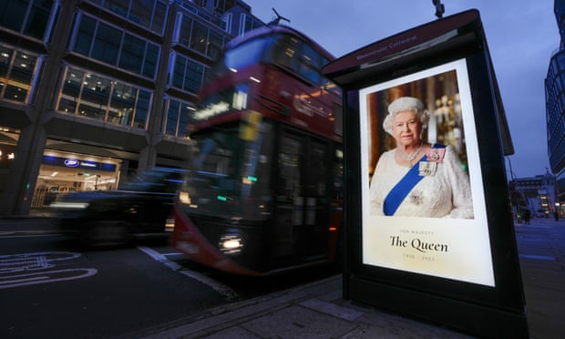 A tribute to Queen Elizabeth II on a bus stop in London.