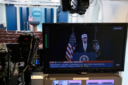 A monitor in the press briefing room at the White House showing Donald Trump’s announcement after strikes on Iran, 28 February 2026