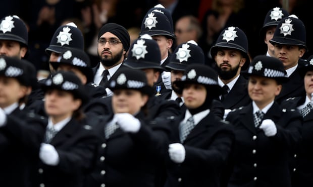 New Metropolitan police officers during their passing-out parade in London.