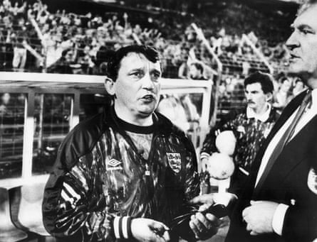 Lawrie McMenemy comforts Graham Taylor after the final whistle after the Netherlands’ 2-0 victory that all but ensured England missed out on qualifying for the 1994 World Cup.