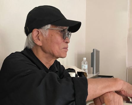 Japanese film-maker Masao Adachi on set