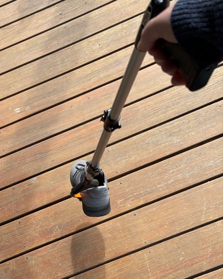 An EZ Pik 36-inch Pro Grabber picking up a shoe