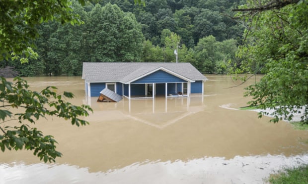 A home is submerged under floodwaters in Jackson, Kentucky.