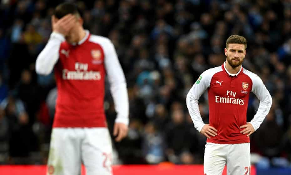 Arsenal’s Shkodran Mustafi, right, ‘reacted to a slight nudge in the back from Sergio Agüero with all the resolve of a flighty Victorian maiden glimpsing a mouse’.
