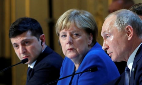 Volodymyr Zelenskiy, left, with Angela Merkel and Vladimir Putin during talks in Paris in December.