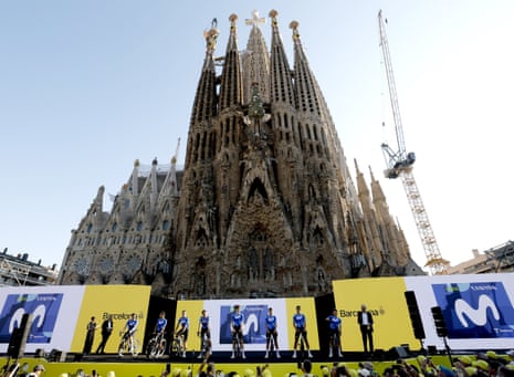Movistar Team on stage in front of the Sagrada Familia at 2026 Tour de France