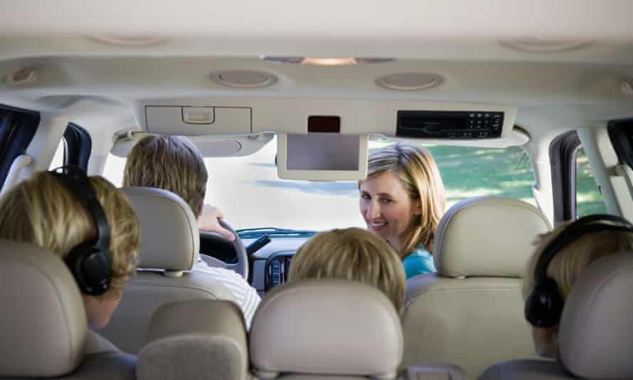 Woman watching son in CarGettyImages-78775048