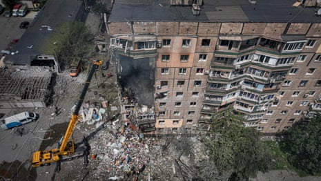 A view of a site of an apartment building heavily damaged by a Russian missile strike in Kryvyi Rih.