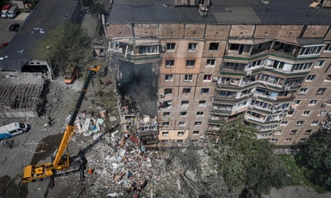 A view of a site of an apartment building heavily damaged by a Russian missile strike in Kryvyi Rih.