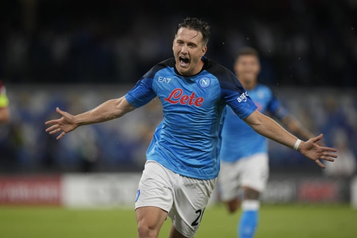 Napoli's Piotr Zielinski celebrates after opening the scoring.