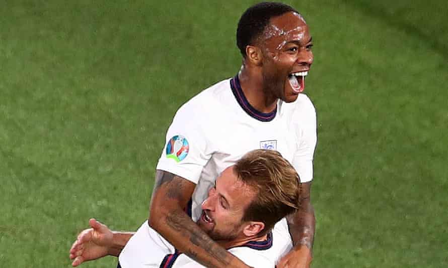 Raheem Sterling and Harry Kane celebrate the captain's third goal against Ukraine