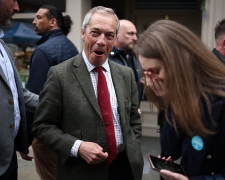 Reform UK leader Nigel Farage speaks with supporters during a campaign visit to Beverley, Britain, 25 April 2025.