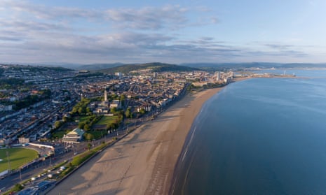 An aerial view of Swansea Bay, South Wales, UK, showing Victoria Park to the city centre
