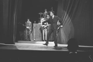 Bruce Forsyth closes the curtain on the Beatles first TV performance at London’s Palladium circa 1963