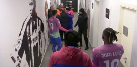 Mike Maignan is consoled in the tunnel at Udinese by Milan’s players and staff.