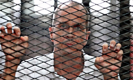 Peter Greste awaiting sentence in Cairo in June last year