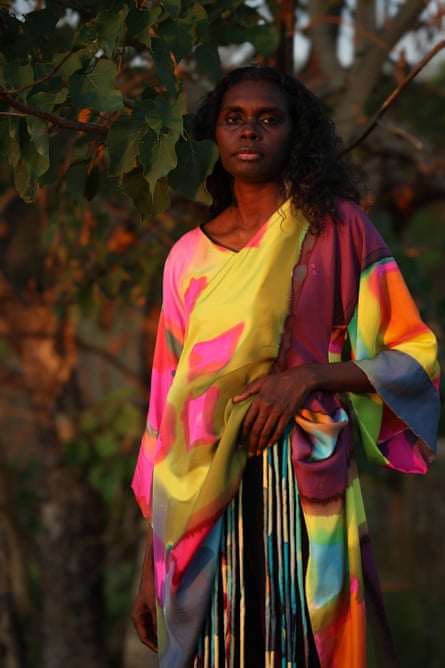 Magnolia Maymuru wearing Tjarlirli & Kaltukatjara Art, Pirriya collection