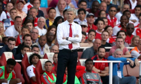 Arsène Wenger watches his Arsenal team slump to a 4-3 defeat against Liverpool at the Emirates on the opening day of the season.