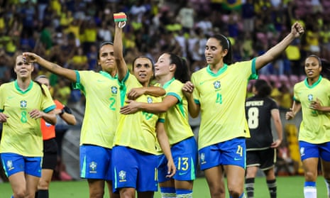 Marta celebrates with her Brazil teammates after scoring against Jamaica in a friendly earlier this month