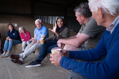 Badenoch speaking with farmers at Hall Farm.