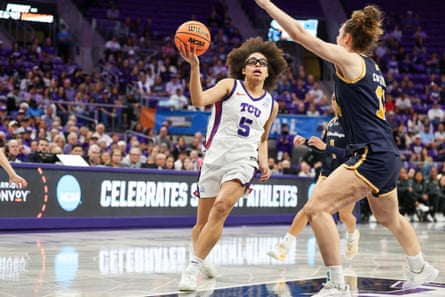 TCU defender Olivia Miles drives to nan handbasket during Friday’s triumph complete UC San Diego.