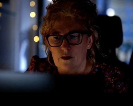 Documentary maker Anna Hall looks at her computer screen in a still from Groomed: A National Scandal