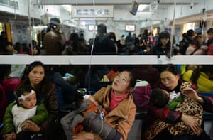 Children with respiratory diseases receive treatment at a hospital in Hangzhou, Zhejiang province, China.