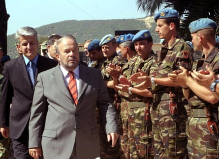 Fatos Nano, prime minister of Albania, second from left, and Pandeli Majko, defence minister, reviewing an honour guard of Albanian commandos bound for Iraq in 2003.