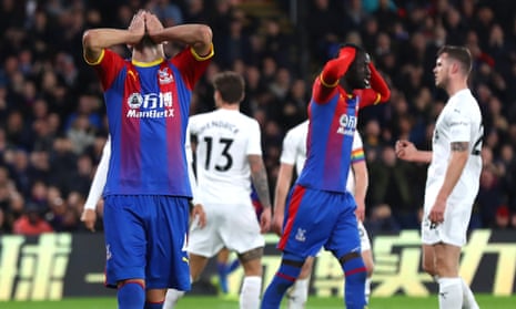 Crystal Palace’s Luka Milivojevic (left) after missing a chance during win over Burnley – one of only three victories this season.