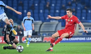 Bayern Munich’s Polish forward Robert Lewandowski shoots to open the scoring.