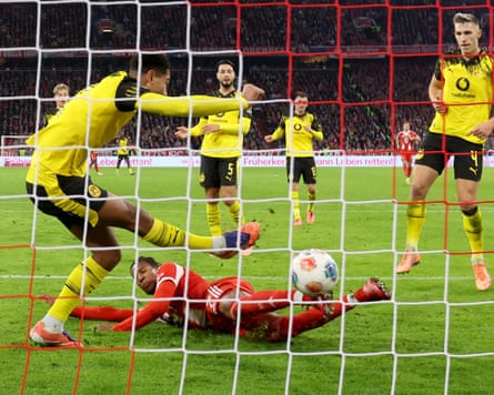 Jobe Bellingham’s attempted clearance is deflected in by Michael Olise for Bayern’s second goal