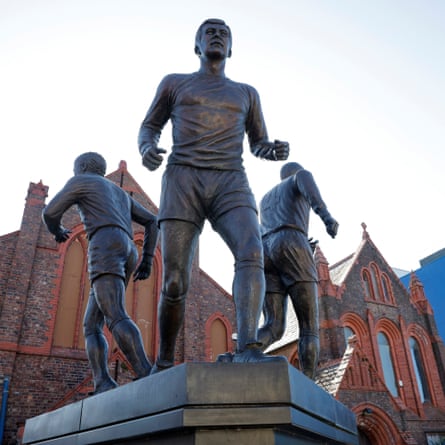 The ‘Holy Trinity’ statue outside St Luke’s Church commemorating the famous Everton players Colin Harvey (facing), Howard Kendall and Alan Ball who helped the club to the 1969-70 league title