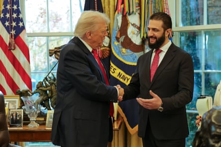 Trump shakes hands with Sharaa at the White House